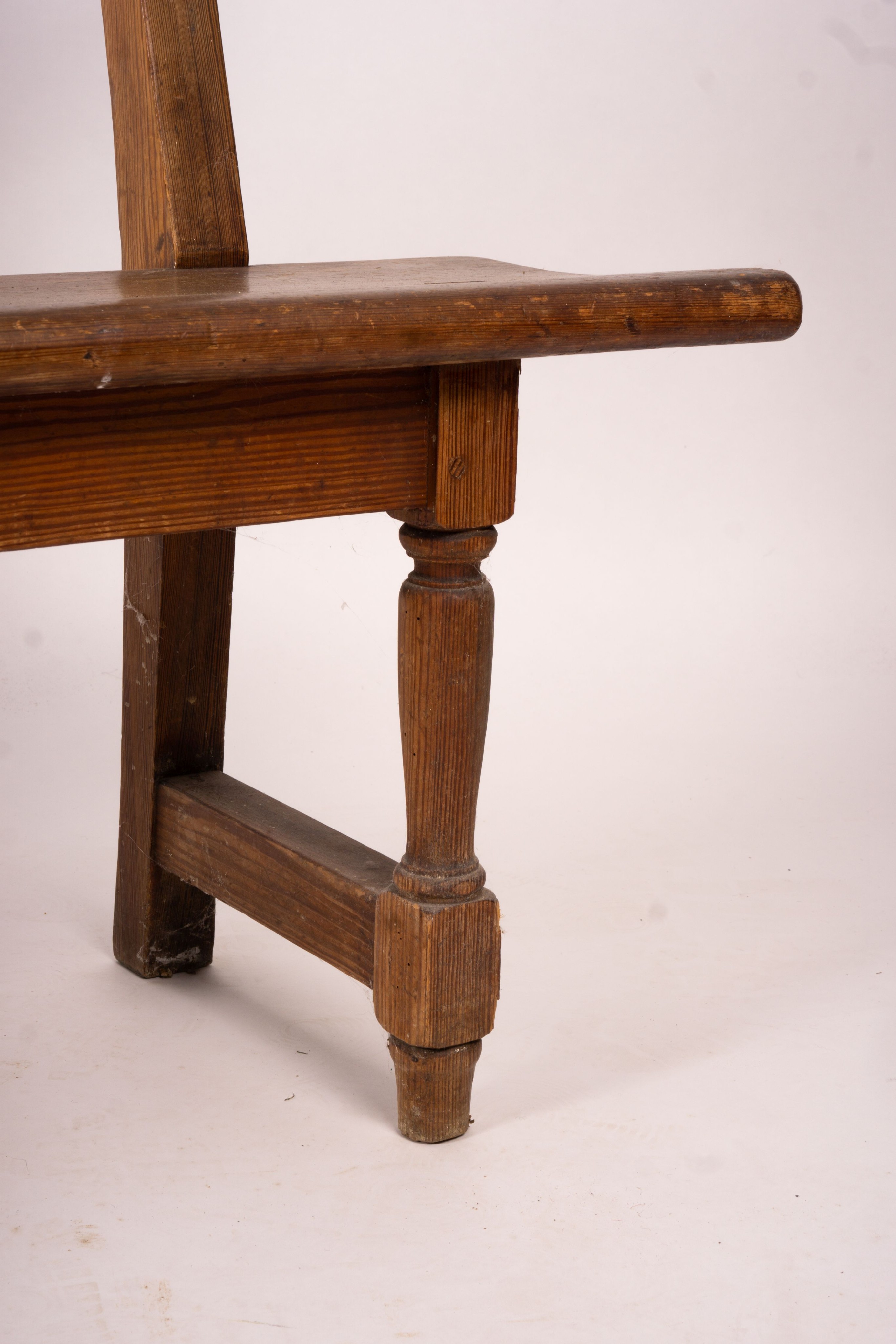 A Victorian pitch pine bench seat, W.214cm H.79cm